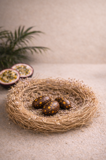 Mini handcrafted eggs made with 38% milk chocolate and passion fruit caramel